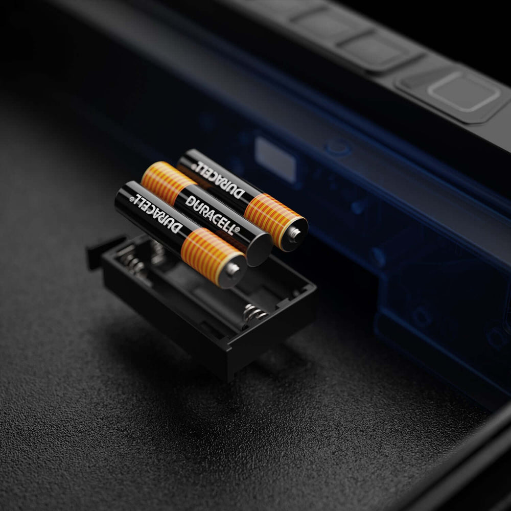Vaultek 10 Series Essential Biometric batteries shown inside the safe, featuring Duracell brand batteries for reliable power.