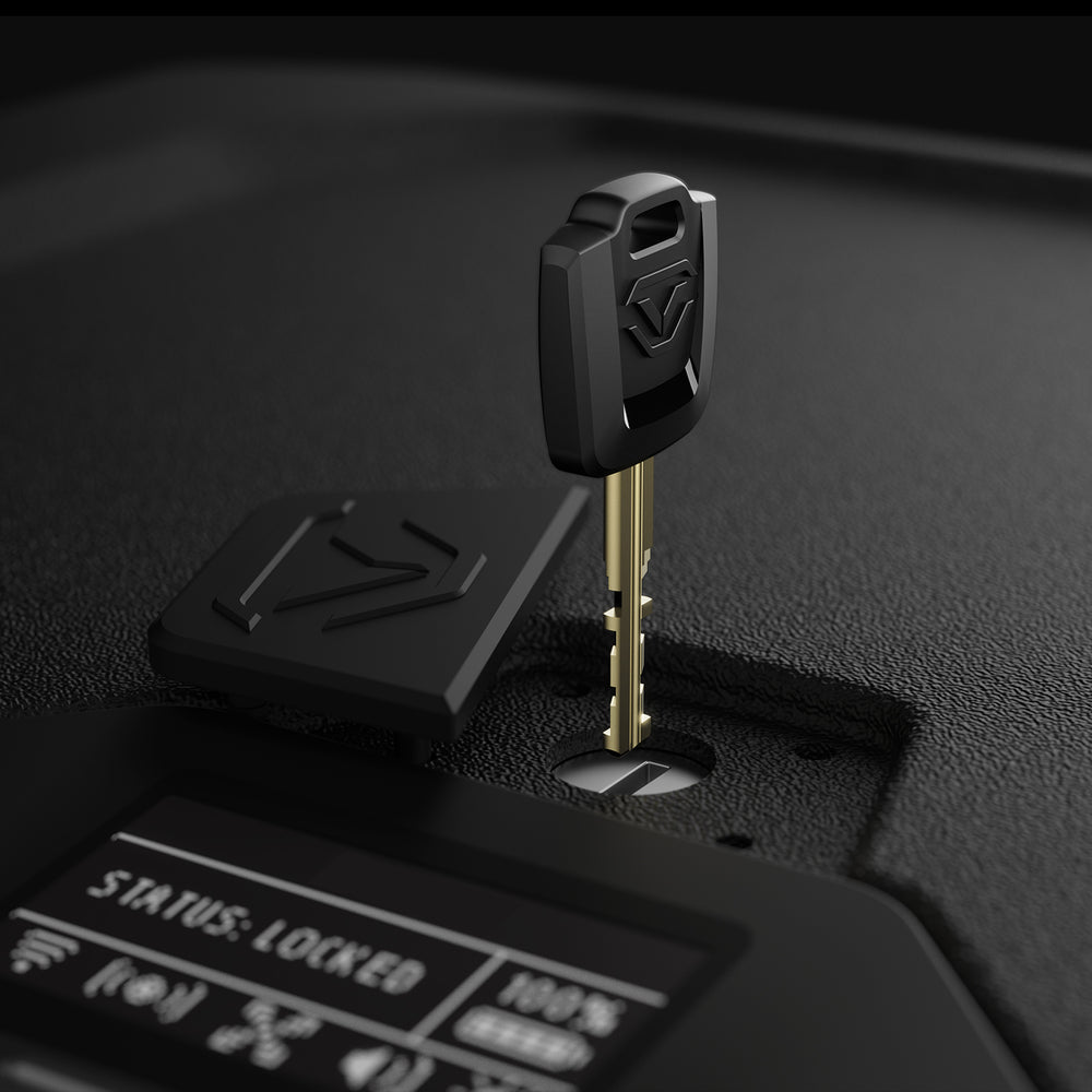 Vaultek MR Series ViSN Biometric Safe key slot with key inserted and status display showing locked.