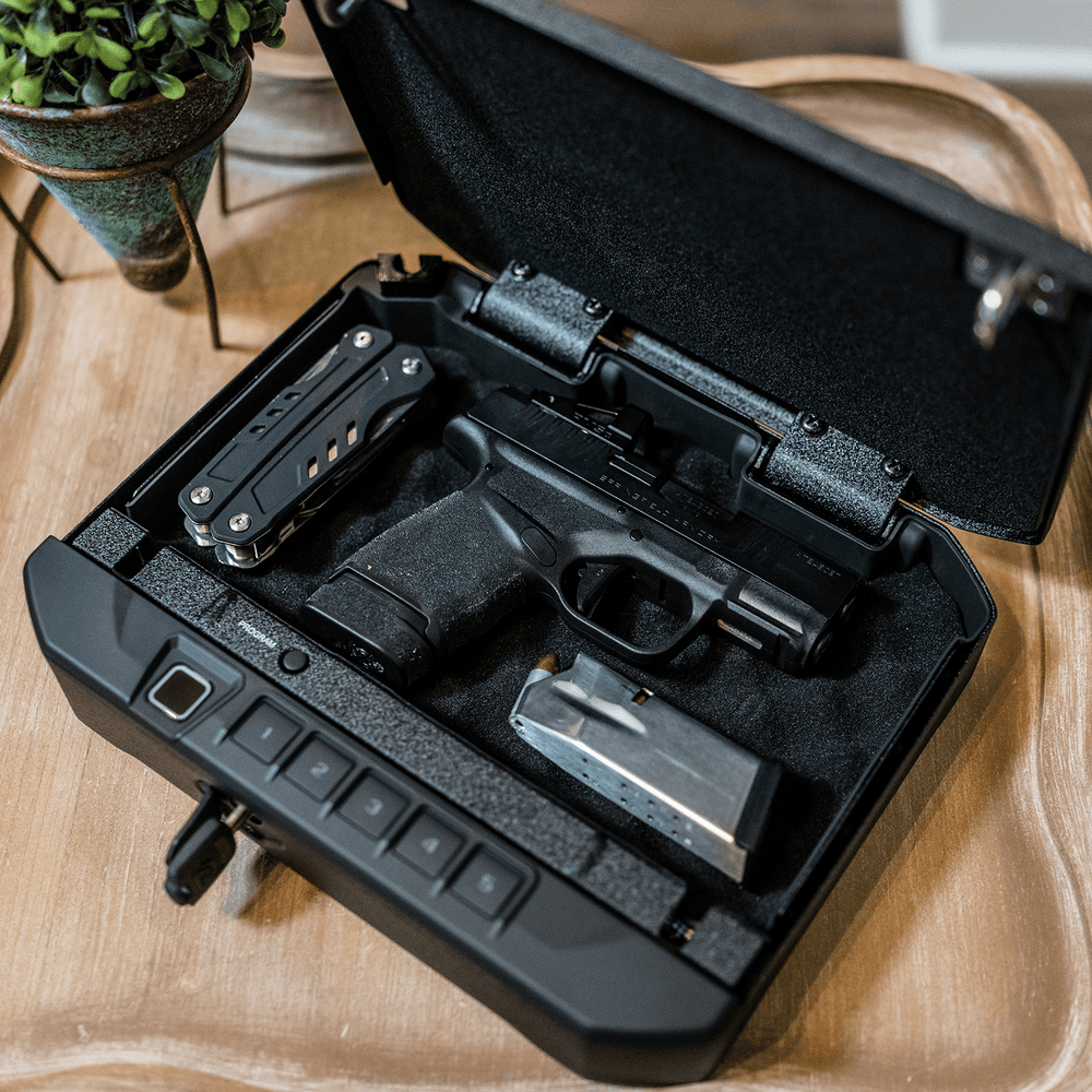 Vaultek 20 Series Biometric safe with handgun and accessories inside, designed for quick access and security.