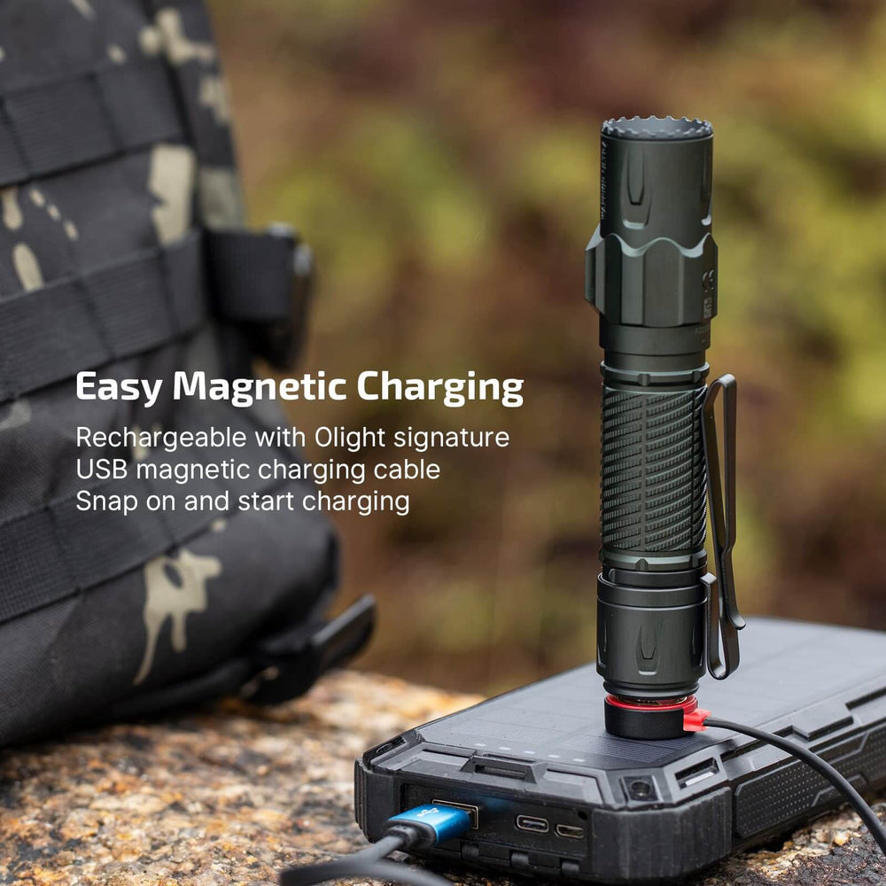 Olight Warrior Ultra 2500 Lumens Tactical Flashlight with easy magnetic charging feature.