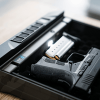 Vaultek 20 Series Biometric safe showing handgun secured inside, designed for quick access and rugged protection.