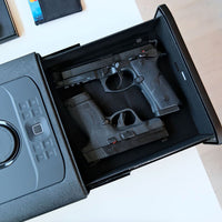 Vaultek DS5i Smart Station ViSN Biometric showing two handguns securely stored in a modern safe.