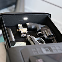 Vaultek DS5i Smart Station ViSN Biometric with a handgun, watch, and everyday essentials stored securely.