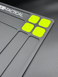 TacticalMat Gun Cleaning Bundle showcasing the gray mat with neon yellow detail for gun cleaning enthusiasts.